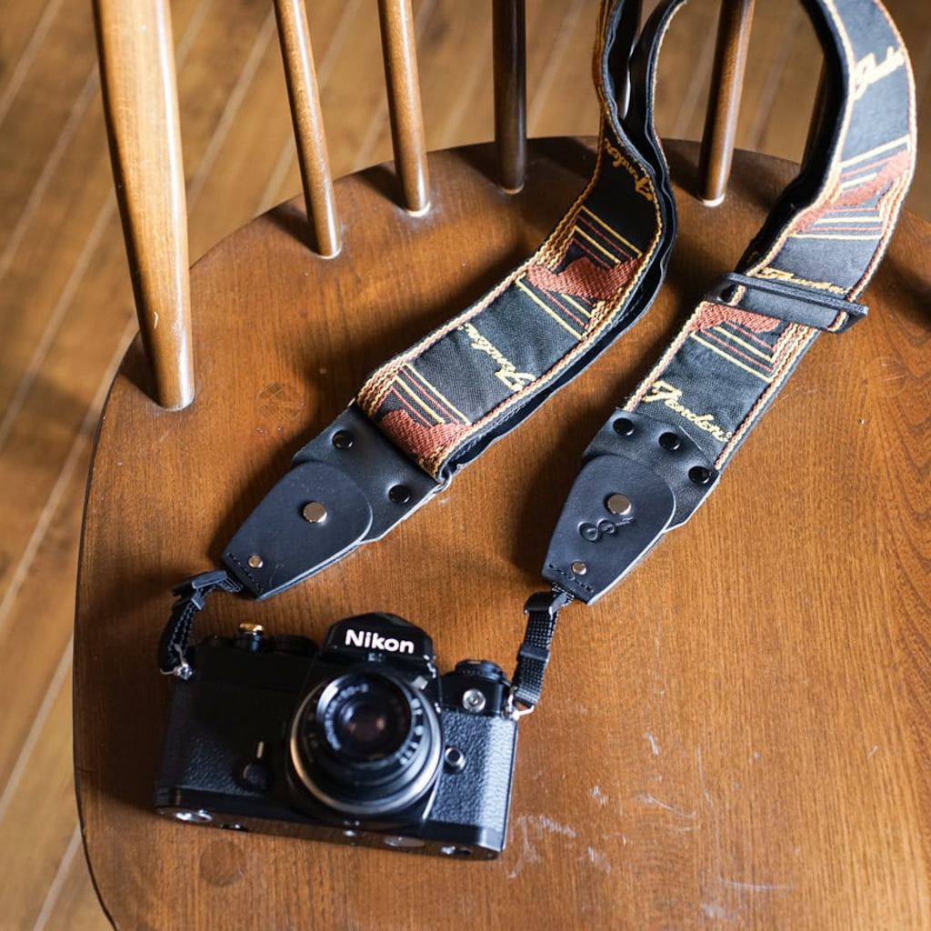 Backstage for Camera | An attachment that turns a guitar strap into a camera strap
